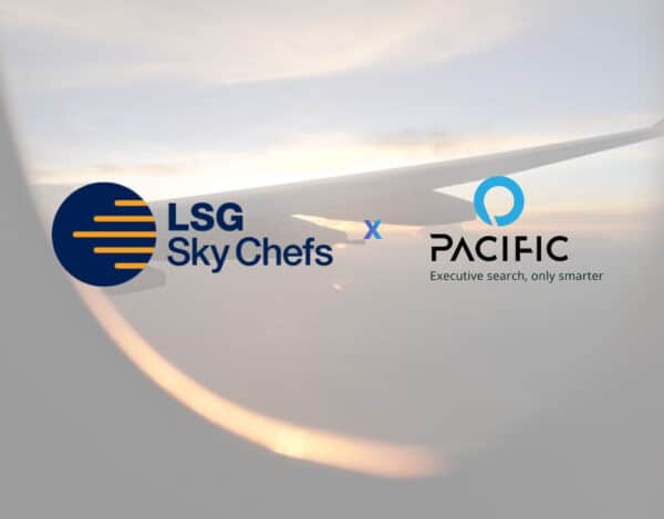 View from an aeroplane window with LSG Sky Chefs and Pacific logos overlaid, highlighting their exclusive partnership and collaboration.